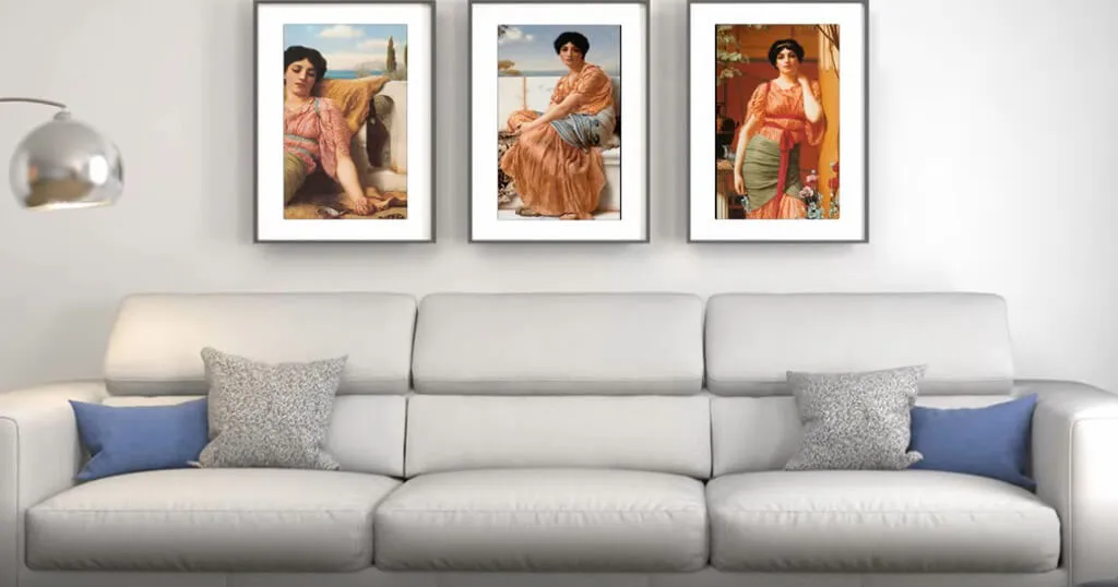 Three digital art frames above a white sofa, each showing a classical painting of a woman in a white mat