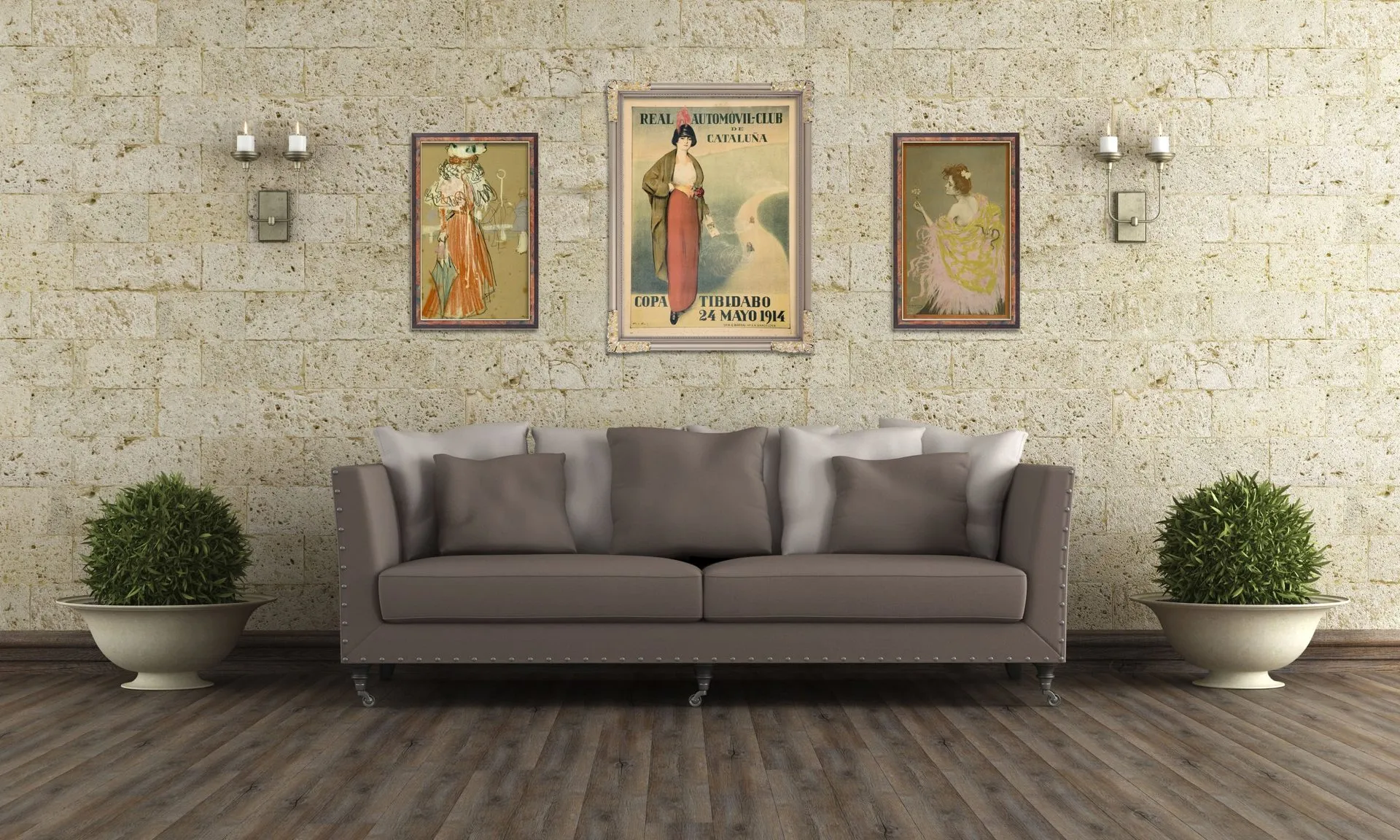 Three framed screens above a sofa on a pale stone wall, showing vintage posters and illustrations